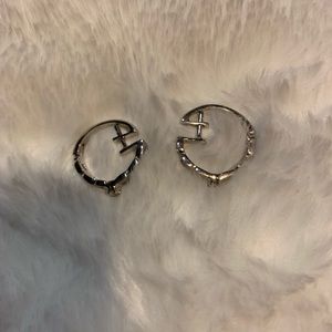 White gold earrings with diamonds .